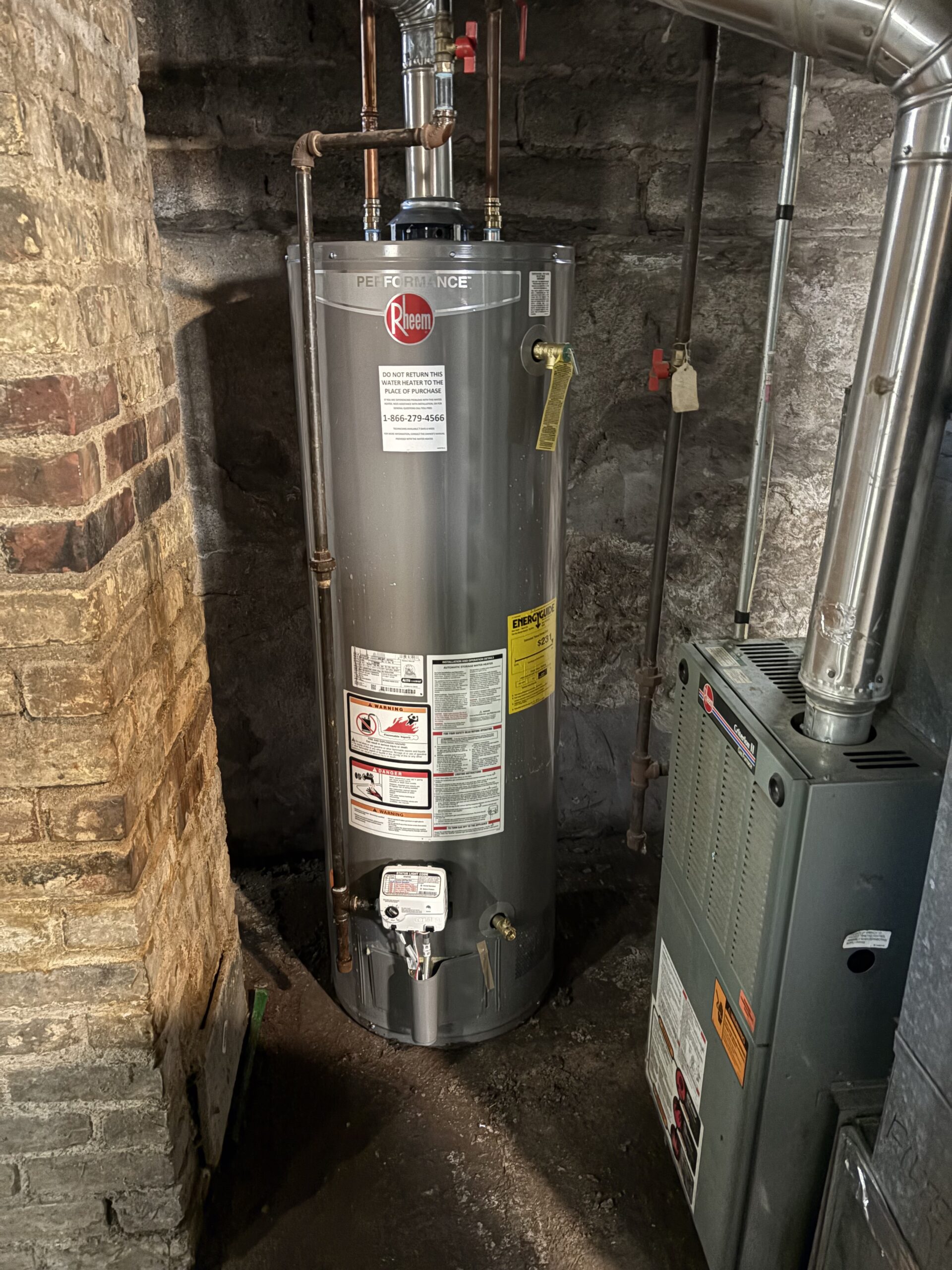 HVAC technician performing a heating and cooling service call