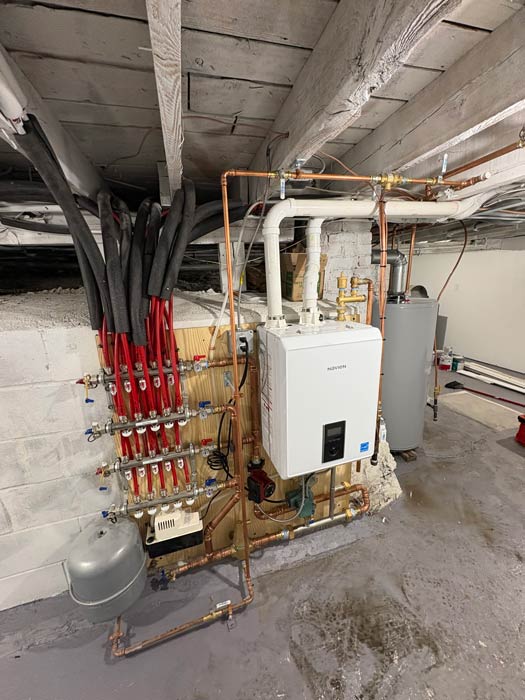HVAC technician performing air conditioning repair in a Monticello, MN home